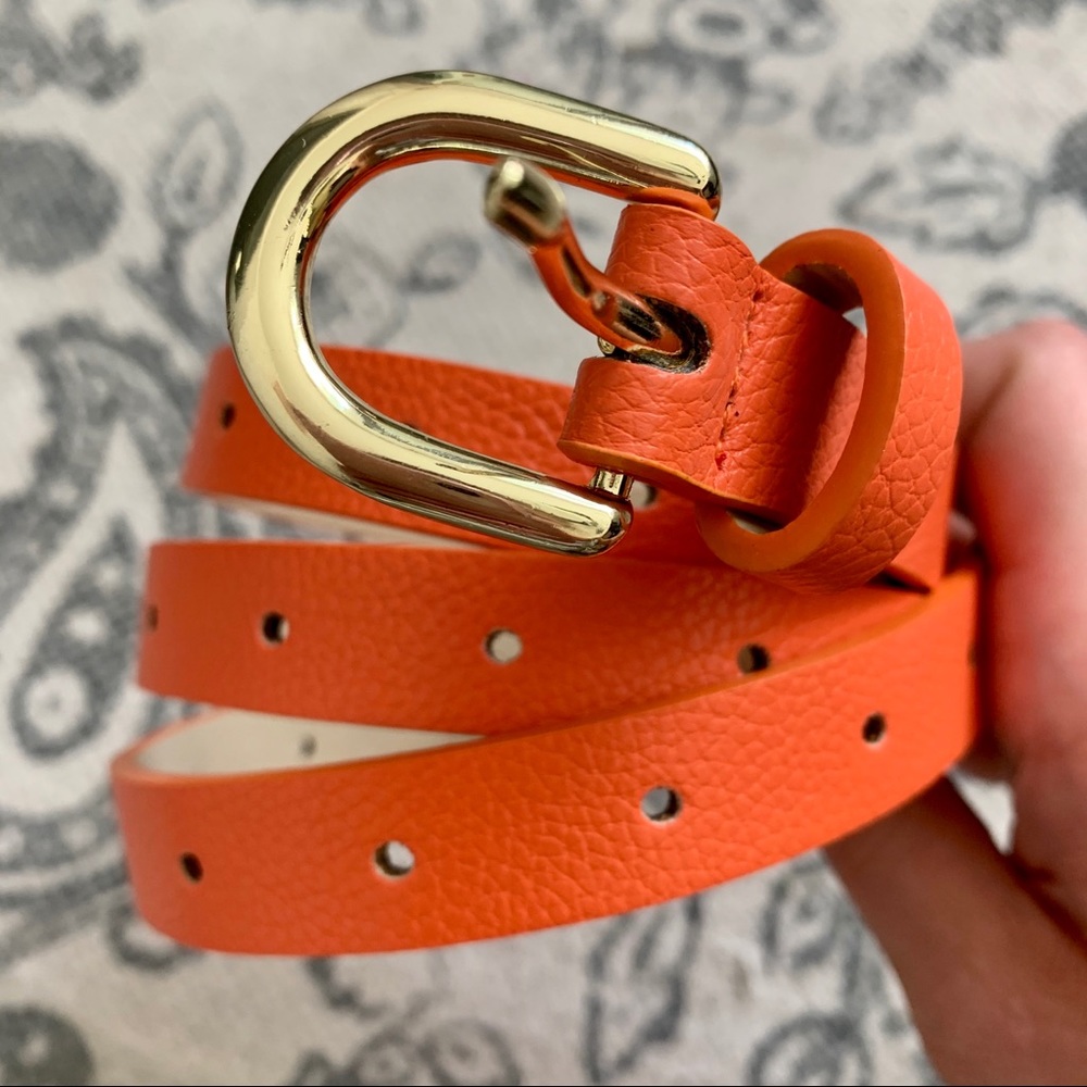 Brand new orange belt with gold buckle S/M